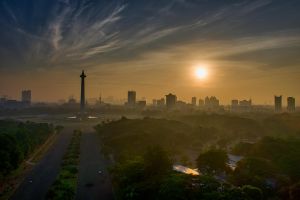 sunset over Jakarta city skyline