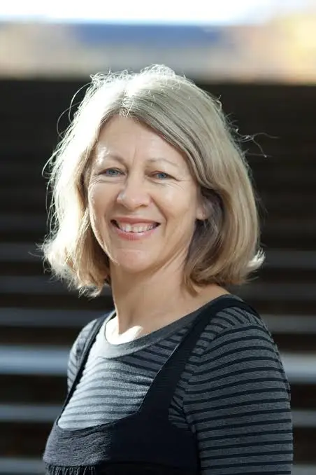 Image for A woman wearing a black top