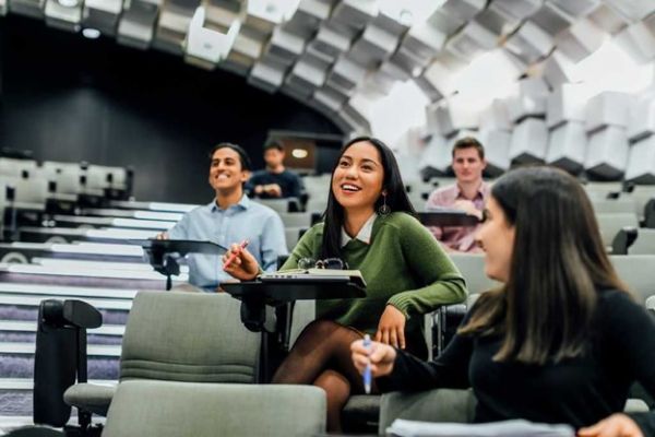 Female sitting in a lecture theatre