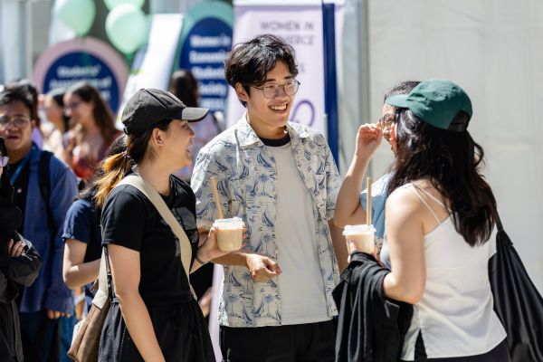 Students chatting at FBE Orientation event