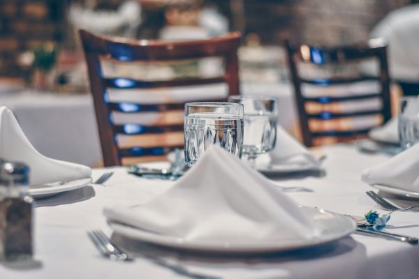 Clear glass cup on table