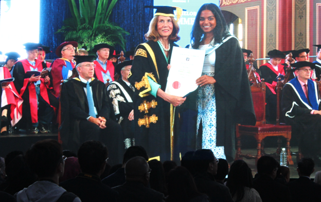 Afra Cader receiving her Bachelor of Commerce 