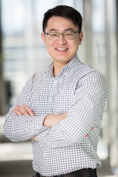 A man wearing a white checked shirt