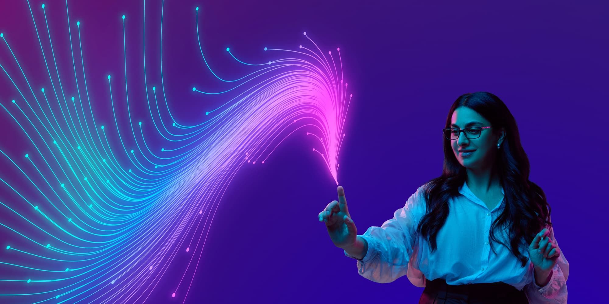 Female with colored streams of light emanating from pointer finger 