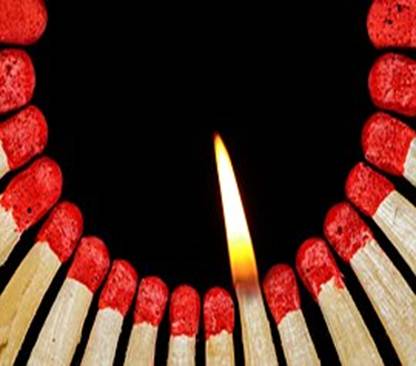 redhead matches in a circle with one alight