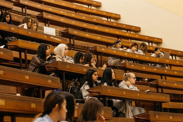 Students in a lecture hall at desks
