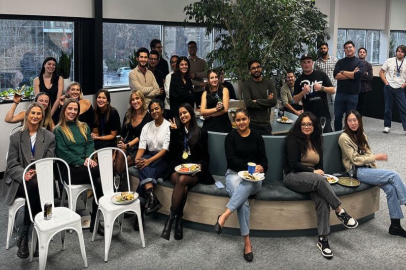 Group of young people in modern office.